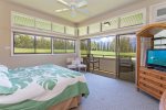 The master bedroom features fabulous views and a private lanai